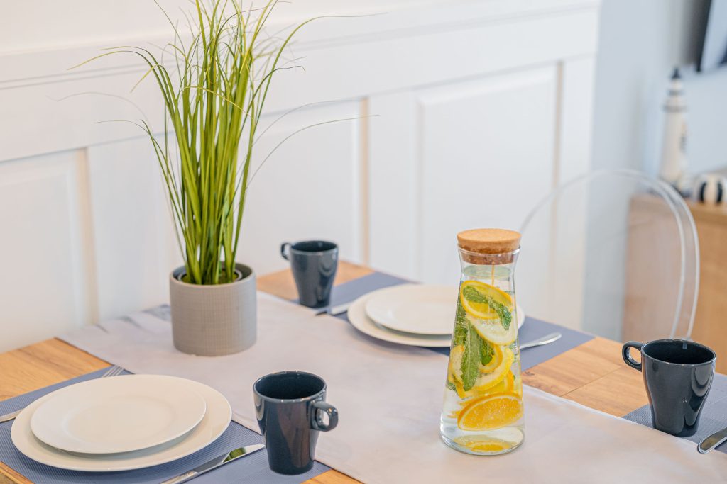 Table set with lemonade – an apartment ready for guests